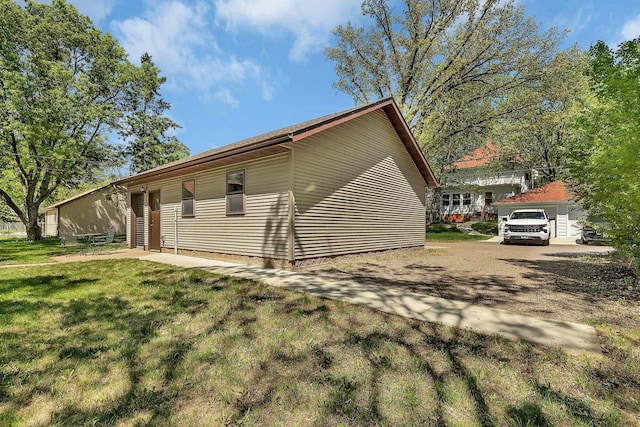 506 Riverside Dr SE, Saint Cloud, MN 56304 - view of property exterior with a yard