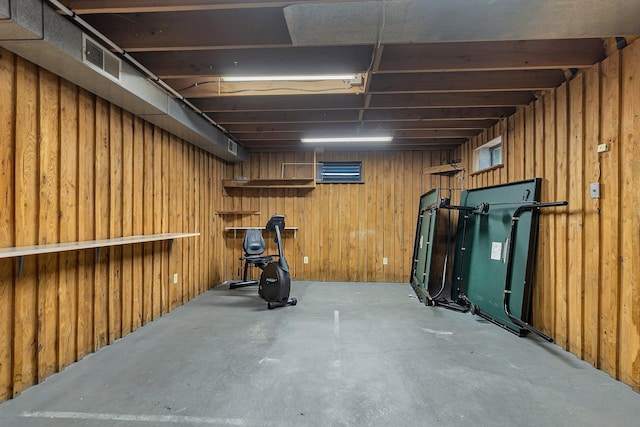 506 Riverside Dr SE, Saint Cloud, MN 56304 - finished basement featuring wooden walls