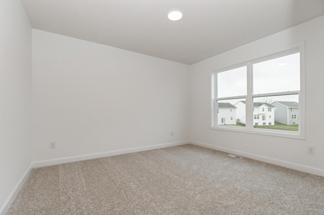 4021 Heath Ln N, Oakdale, MN 55128 - empty room with light carpet and baseboards