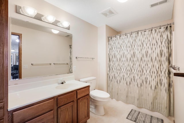 full bathroom featuring vanity, toilet, curtained shower, and tile patterned flooring