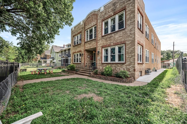 3608 Park Ave Unit 102, Minneapolis, MN 55407 - back of property with brick siding
