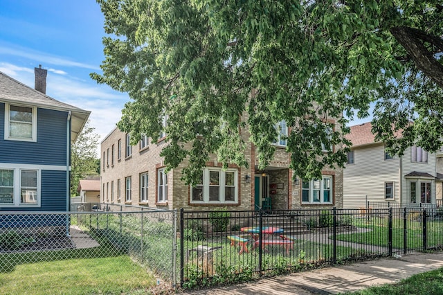 3608 Park Ave Unit 102, Minneapolis, MN 55407 - view of front of home featuring brick siding