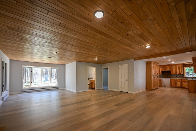 1192 Blackburn Rd, Scott Twp, WI 54801 - unfurnished living room featuring wooden ceiling, light wood-type flooring, recessed lighting, plenty of natural light, and baseboards