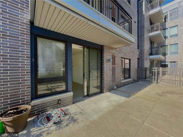 7601 Aldrich Ave S Unit 119, Richfield, MN 55423 - entrance to property featuring brick siding and a patio area