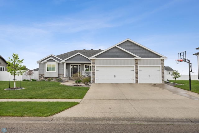 craftsman inspired home with stone siding, an attached garage, and driveway