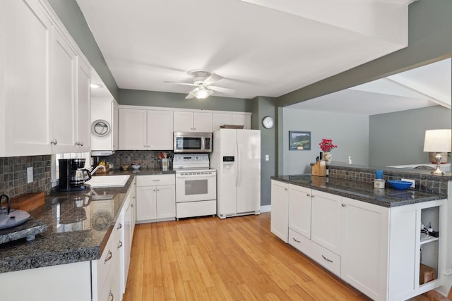 2241 17th St NW, New Brighton, MN 55112 - kitchen featuring white appliances, tasteful backsplash, white cabinetry, and a ceiling fan