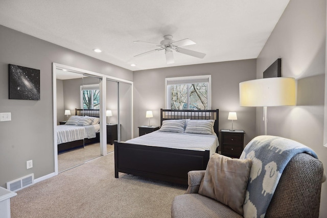 2241 17th St NW, New Brighton, MN 55112 - bedroom with two closets, carpet, recessed lighting, a ceiling fan, and baseboards
