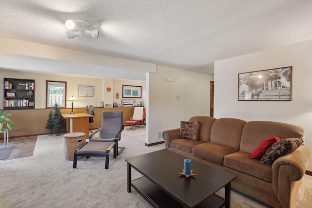 2241 17th St NW, New Brighton, MN 55112 - living room with a textured ceiling and light colored carpet