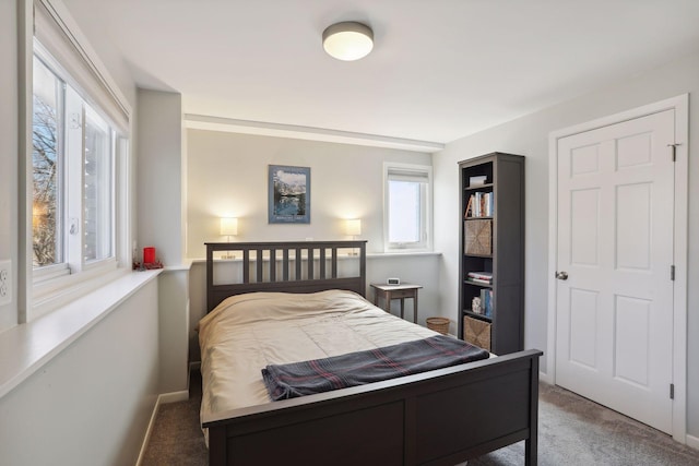 2241 17th St NW, New Brighton, MN 55112 - bedroom with carpet and baseboards