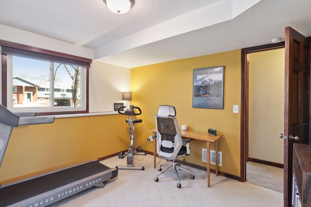 2241 17th St NW, New Brighton, MN 55112 - workout room featuring carpet, baseboards, and a textured ceiling