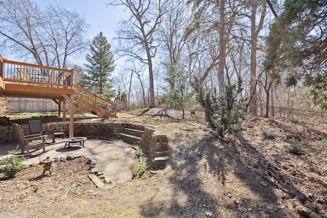 2241 17th St NW, New Brighton, MN 55112 - view of yard with stairs, a patio area, an outdoor fire pit, and a deck
