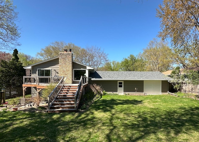 2241 17th St NW, New Brighton, MN 55112 - back of house featuring stairs, a chimney, a wooden deck, and a shingled roof