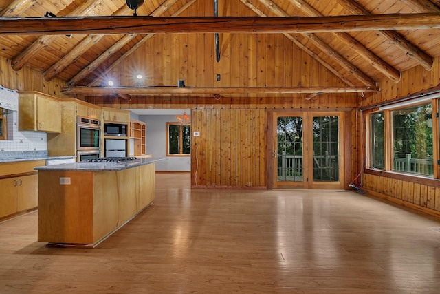 13047 Endicott Dr NW, Clearwater, MN 55320 - kitchen with wooden walls, wooden ceiling with exposed beams, a center island, high vaulted ceiling, and light wood-style floors