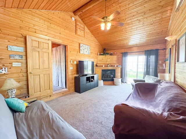 41443 County Highway 1, Ottertail, MN 56571 - carpeted living area featuring wooden walls, wood ceiling, a glass covered fireplace, and a ceiling fan