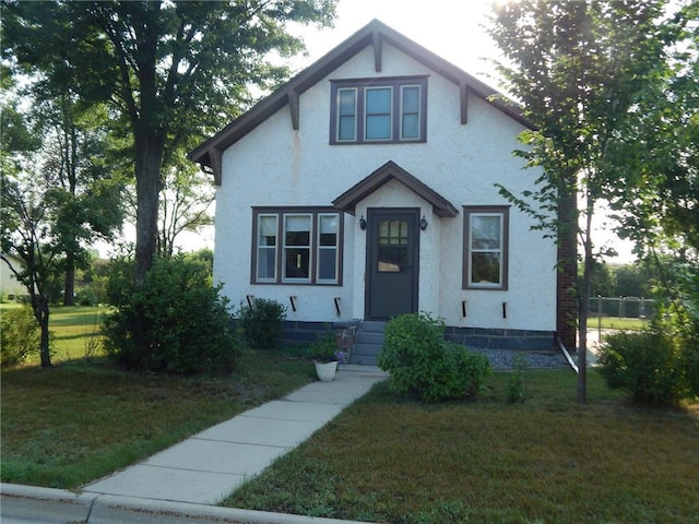 view of front of home featuring stucco siding