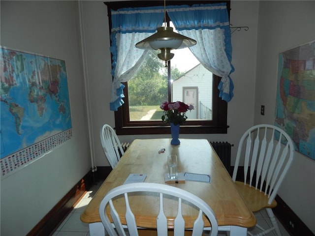 dining room with tile patterned flooring