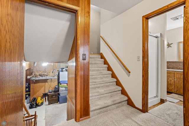 2807 Edgewood Dr N, Fargo, ND 58102 - stairway featuring carpet