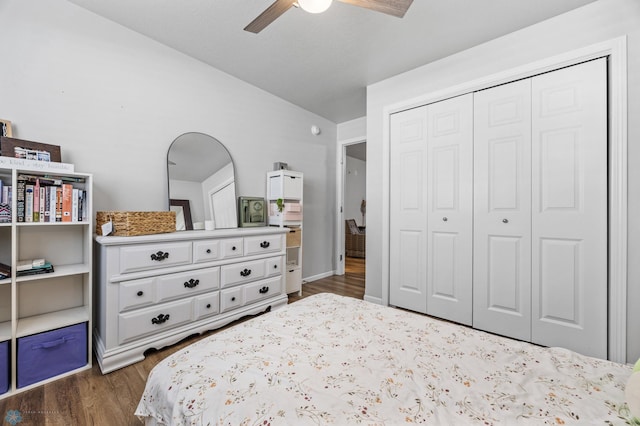 977 Ashley Dr W, West Fargo, ND 58078 - bedroom with a closet, dark wood-style flooring, ceiling fan, and vaulted ceiling
