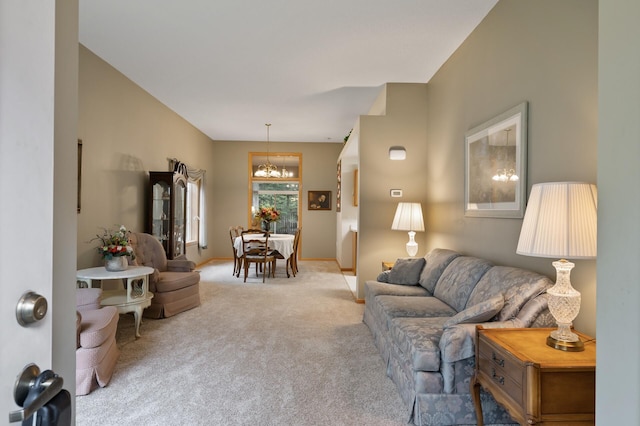 19136 Concord Ct NW, Elk River, MN 55330 - living room with carpet floors, a chandelier, and baseboards