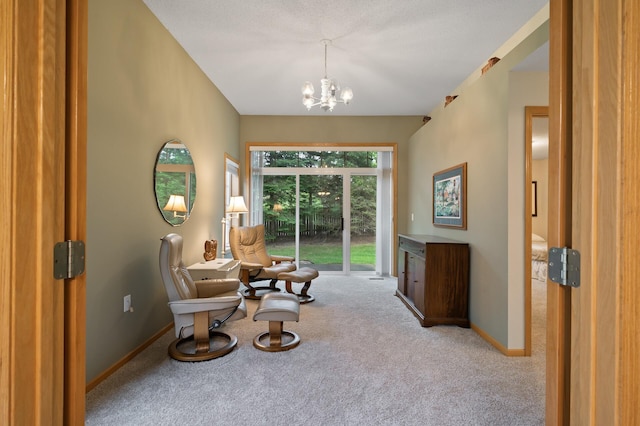 19136 Concord Ct NW, Elk River, MN 55330 - sitting room featuring carpet, a chandelier, and baseboards