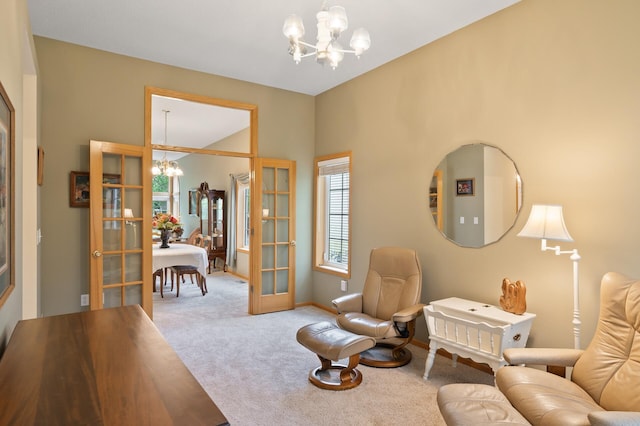 19136 Concord Ct NW, Elk River, MN 55330 - sitting room with a chandelier, carpet floors, french doors, and baseboards