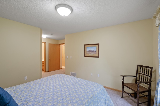 19136 Concord Ct NW, Elk River, MN 55330 - bedroom with light colored carpet and a textured ceiling