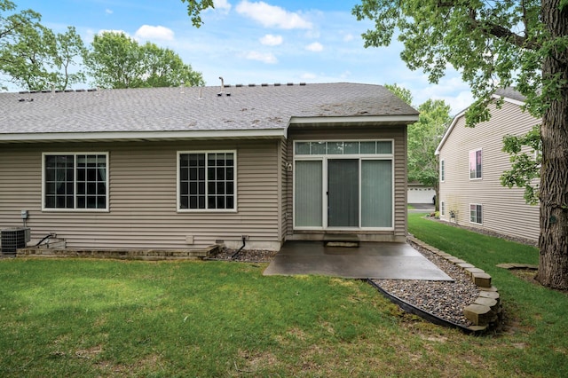 19136 Concord Ct NW, Elk River, MN 55330 - rear view of property featuring a lawn, a patio area, cooling unit, crawl space, and a shingled roof