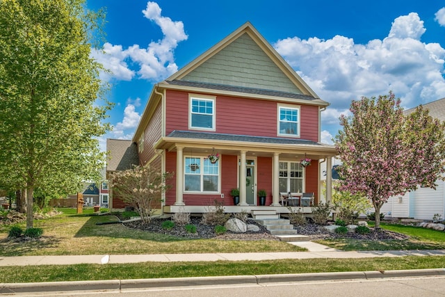 1013 Planters Path, Bayport, MN 55003 - view of front facade featuring a porch and a front lawn