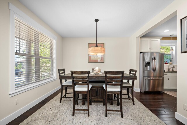 1013 Planters Path, Bayport, MN 55003 - dining area featuring dark wood-style flooring, baseboards, and recessed lighting