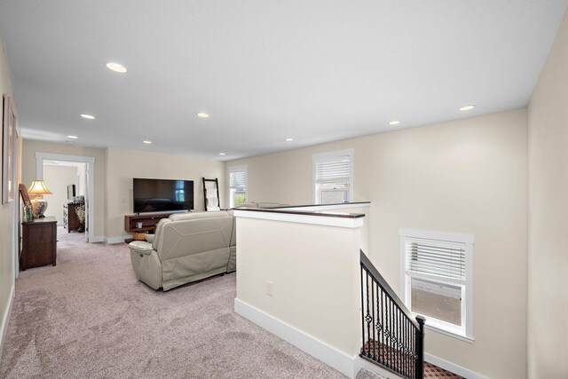 1013 Planters Path, Bayport, MN 55003 - carpeted living area featuring recessed lighting and baseboards