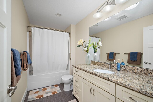 1013 Planters Path, Bayport, MN 55003 - bathroom with vanity, toilet, and shower / bath combo with shower curtain