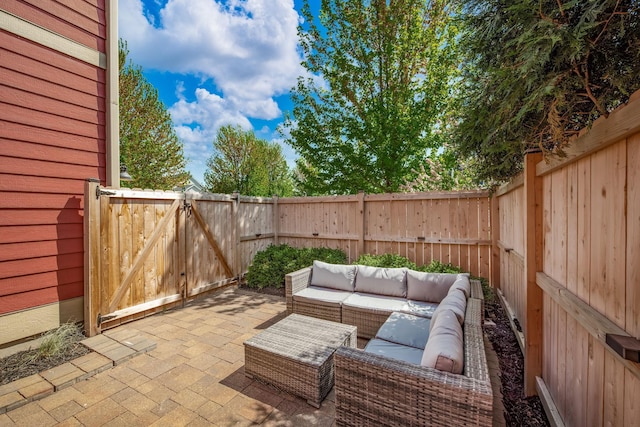 1013 Planters Path, Bayport, MN 55003 - view of patio / terrace featuring an outdoor hangout area, a fenced backyard, and a gate
