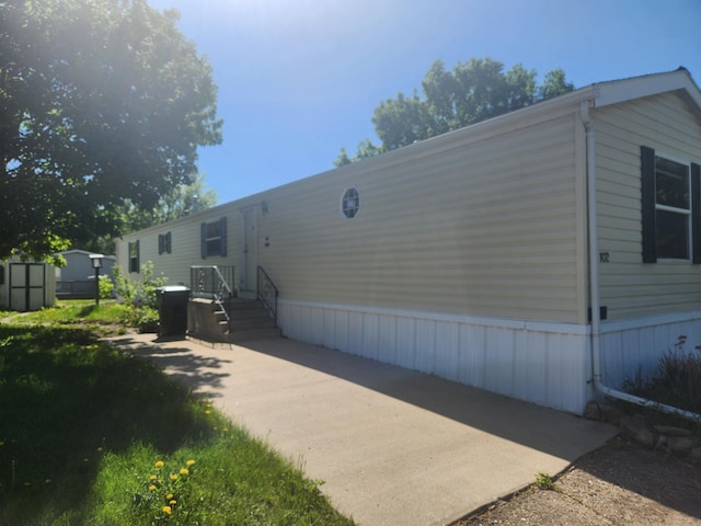 102 Jaybee Ln, Mankato, MN 56001 - view of property exterior featuring a patio area