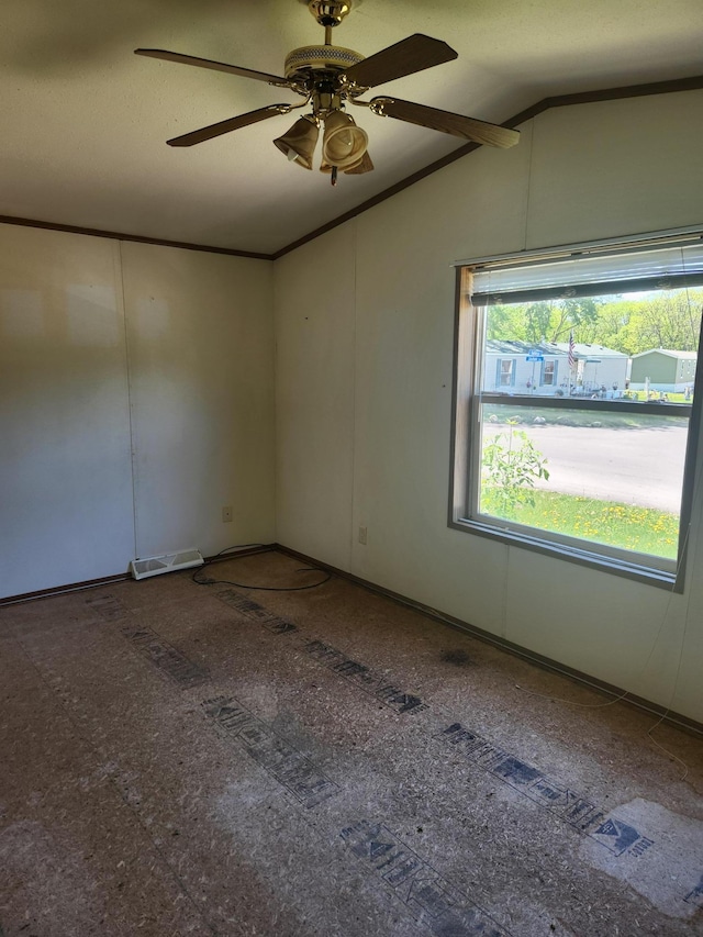 102 Jaybee Ln, Mankato, MN 56001 - spare room featuring vaulted ceiling, a ceiling fan, and ornamental molding