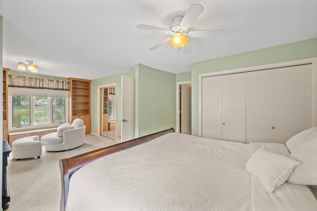 bedroom with a closet and a ceiling fan