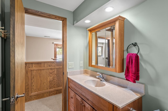 bathroom with vanity and recessed lighting