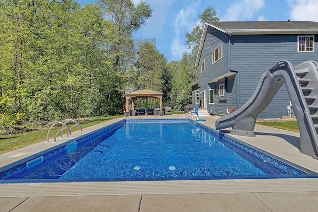 1502 9th St N, Sartell, MN 56377 - outdoor pool featuring a water slide, a gazebo, an outdoor living space, and a patio