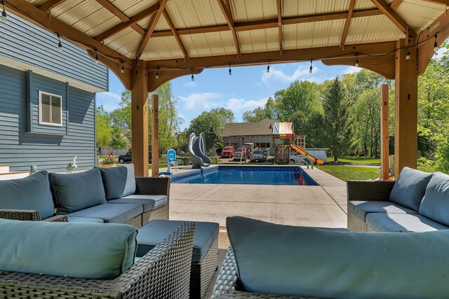 1502 9th St N, Sartell, MN 56377 - view of patio with a gazebo, outdoor lounge area, and an outdoor pool