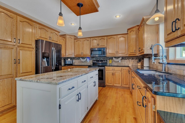 1502 9th St N, Sartell, MN 56377 - kitchen with stainless steel appliances, a sink, dark stone countertops, backsplash, and a kitchen island