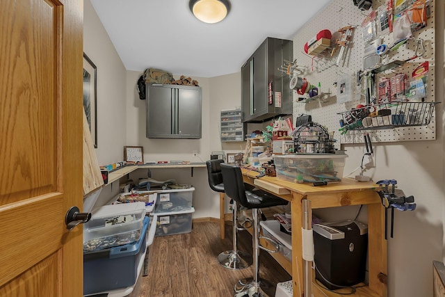 1502 9th St N, Sartell, MN 56377 - kitchen featuring dark wood-type flooring, a desk, and baseboards
