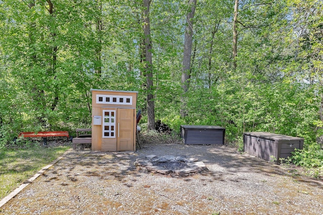 1502 9th St N, Sartell, MN 56377 - view of outbuilding with a wooded view