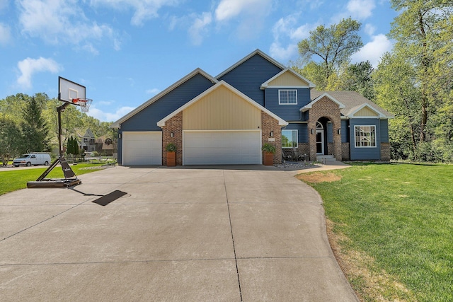 1502 9th St N, Sartell, MN 56377 - view of front of home featuring a front yard, brick siding, driveway, a garage, and board and batten siding