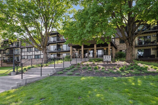 215 Barry Ave S Unit 306, Wayzata, MN 55391 - view of community with a lawn and stairs