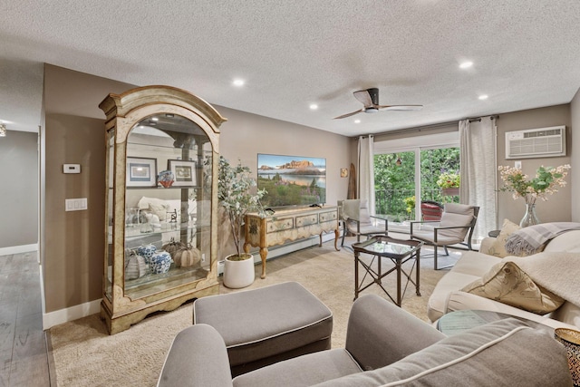 215 Barry Ave S Unit 306, Wayzata, MN 55391 - living room featuring a textured ceiling, recessed lighting, a baseboard radiator, ceiling fan, and a wall mounted air conditioner