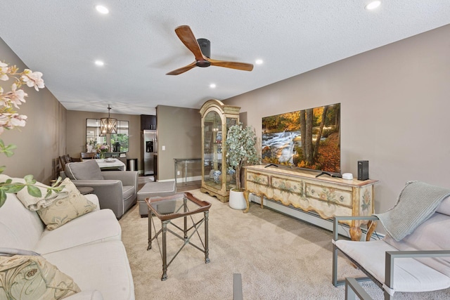 215 Barry Ave S Unit 306, Wayzata, MN 55391 - living area featuring a chandelier, recessed lighting, light carpet, a ceiling fan, and a baseboard radiator