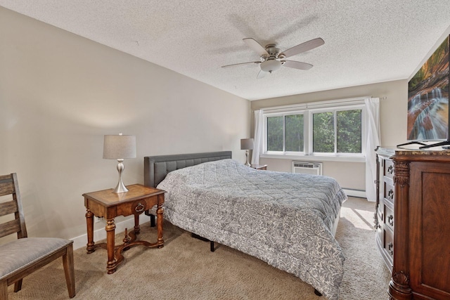 215 Barry Ave S Unit 306, Wayzata, MN 55391 - bedroom featuring light colored carpet, a textured ceiling, a baseboard radiator, a wall mounted air conditioner, and baseboards