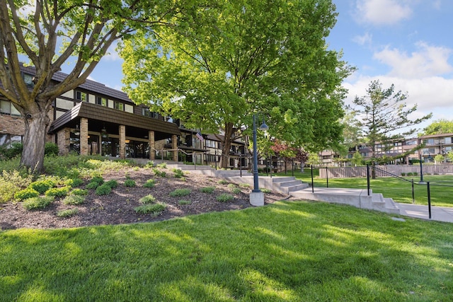 215 Barry Ave S Unit 306, Wayzata, MN 55391 - view of property's community with a lawn