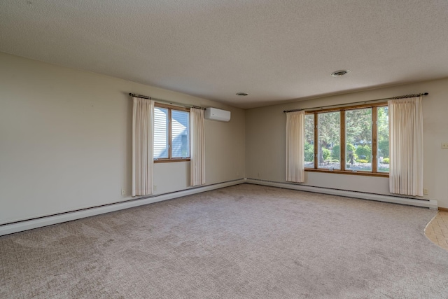 529 Spring St Unit 4, Kenyon, MN 55946 - unfurnished room with a wall mounted AC, carpet, and a textured ceiling