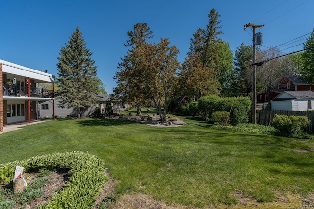529 Spring St Unit 4, Kenyon, MN 55946 - view of yard with a balcony