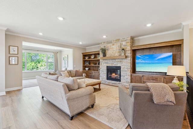 8014 Walnut Ln, Corcoran, MN 55340 - living area featuring ornamental molding, wood finished floors, a stone fireplace, and recessed lighting